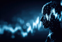 Czym są finanse behawioralne i jak wpływają na decyzje inwestorów? sylwetka głowy na tle danych finansowych symbol psychologii decyzji finansowych