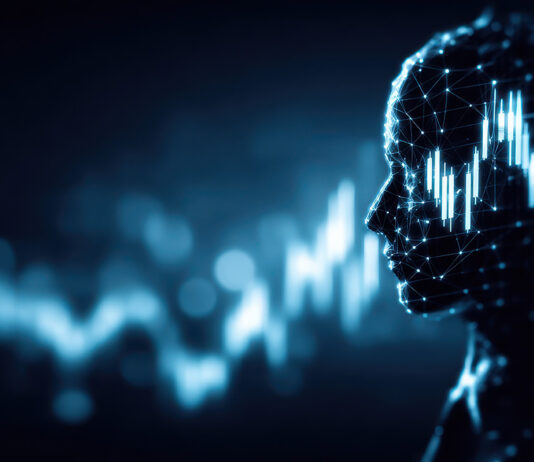 Czym są finanse behawioralne i jak wpływają na decyzje inwestorów? sylwetka głowy na tle danych finansowych symbol psychologii decyzji finansowych